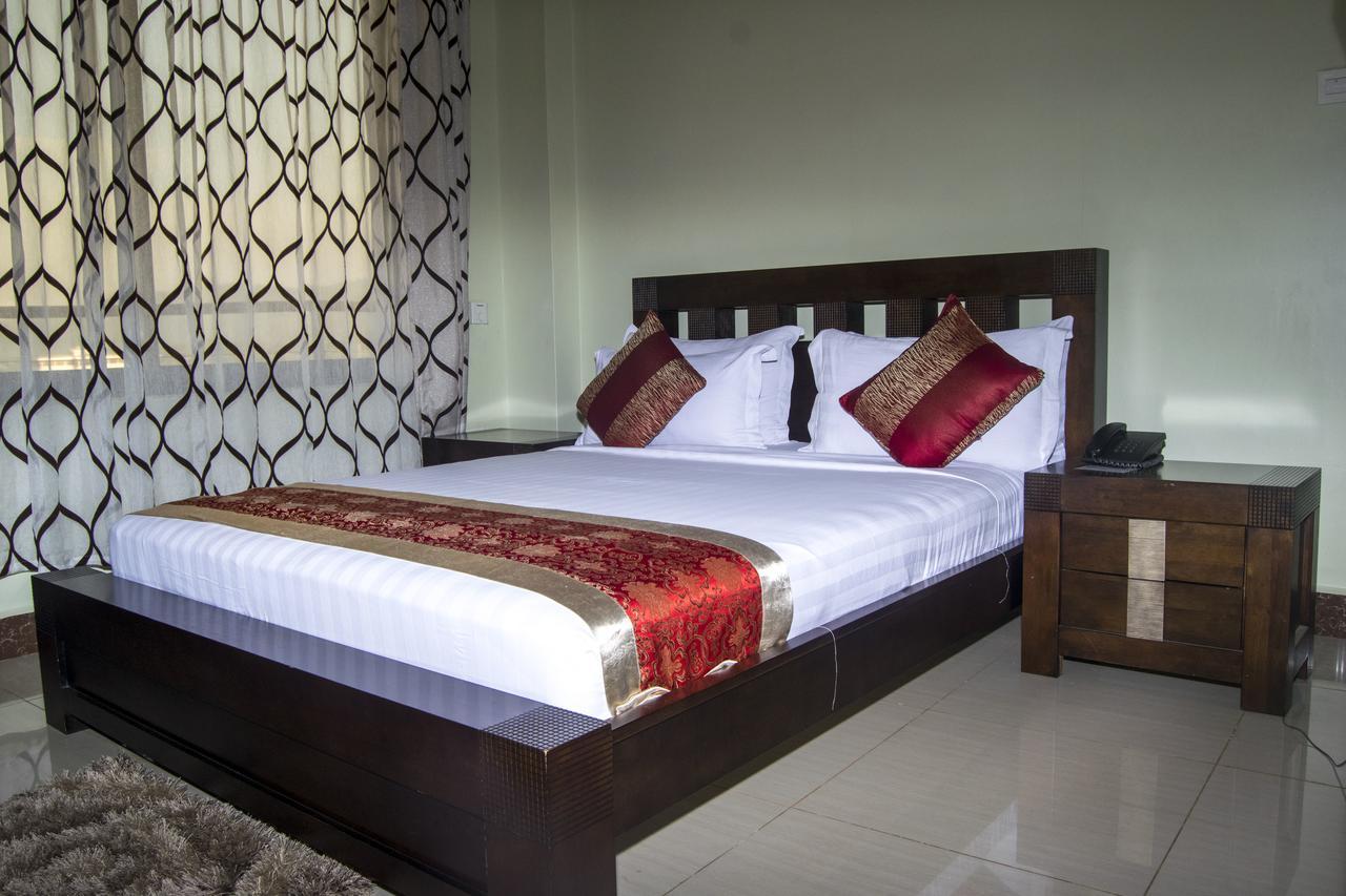 Flomi Hotel Morogoro Habitación foto